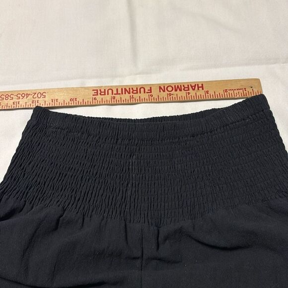 Black Ruffle Hem Wide-Leg Gaucho Pants. Elastic waist and ruffle hemline - Picture 11 of 11